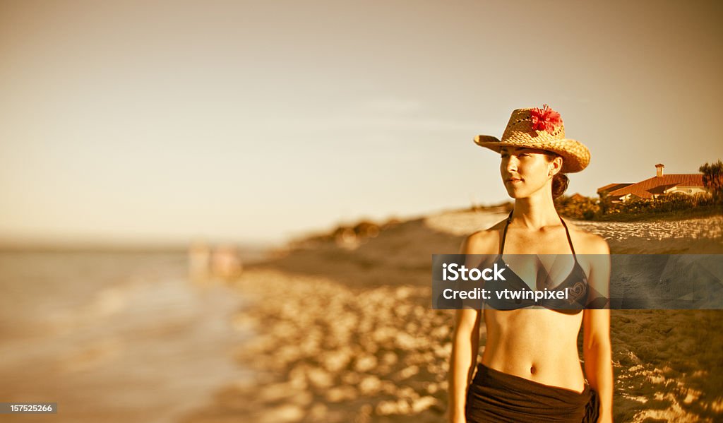 Young women walking in the sunset.  30-39 Years Stock Photo