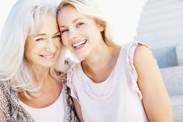istock Mother smiling with her daughter 157525319