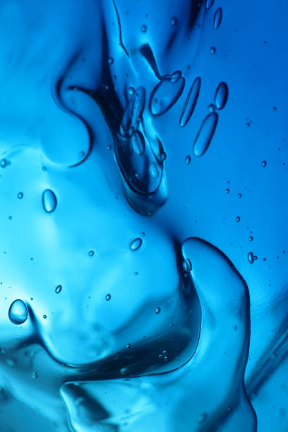 a design of liquid blue with drops  - hårgelé bildbanksfoton och bilder