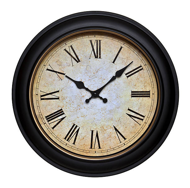 Old Wall Clock With Roman Numerals stock photo