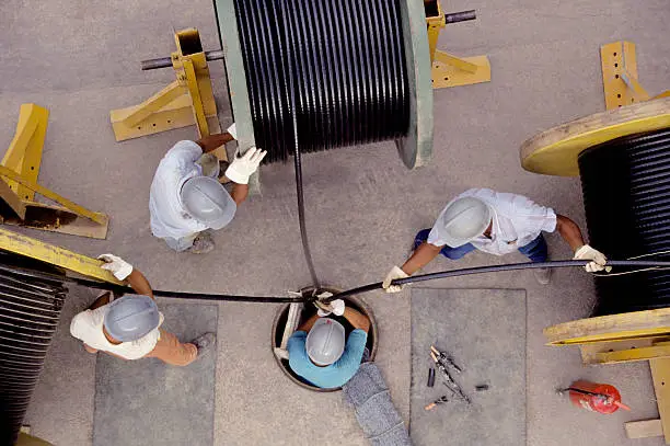 Photo of Overhead shot of electricians working 