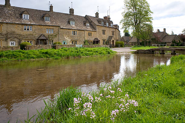 istock UK, Gloucestershire, Cotswolds, Lower Slaughter, River Eye, Cotswold Cottages 157525872