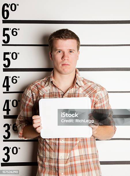 Photo libre de droit de Mugshot Dun Jeune Homme banque d'images et plus d'images libres de droit de Photo d'identité judiciaire - Photo d'identité judiciaire, Hommes, Identification de suspect