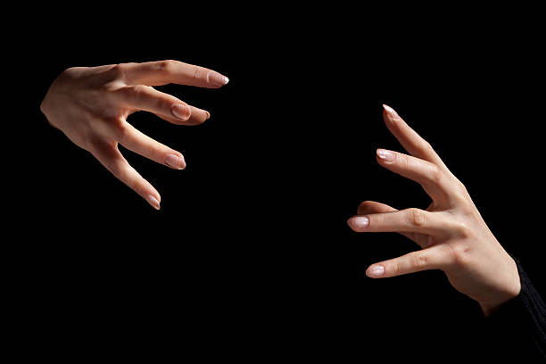 Magic Fingers; Two Intense Hands Hold Nothing Inbetween, Black Background  choking stock pictures, royalty-free photos & images