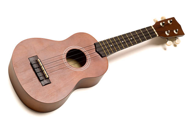 ukulele guitarra no branco - uke - fotografias e filmes do acervo