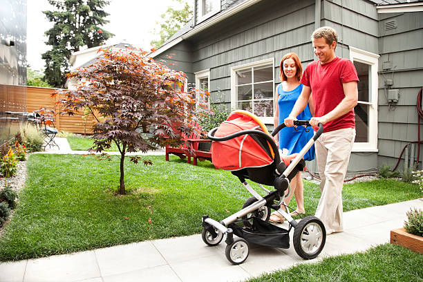 istock Young Family Walking with Stroller 157527392