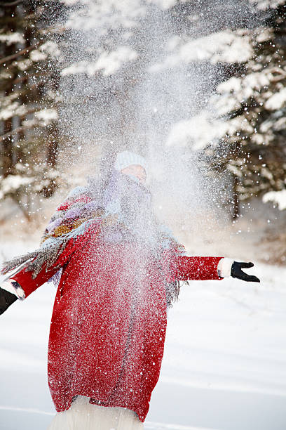 istock young woman in snow 157527452