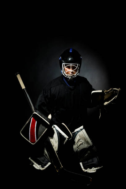 istock Goalie on a black background 157527568