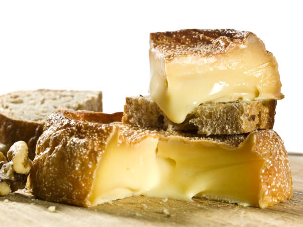 Époisses de Bourgogne French cheese on white background. (this picture has been shot with a High Definition Hasselblad H3D II 31 megapixels camera and 120 mm f4H Hasselblad macro lens)