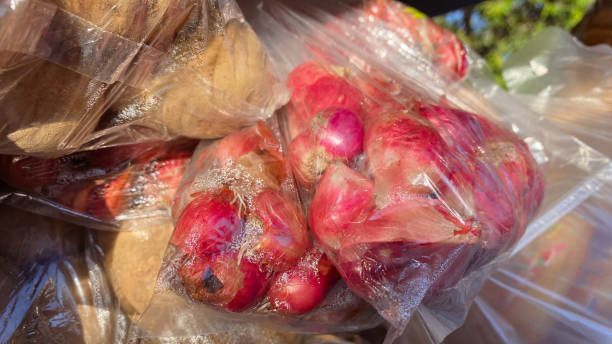 istock Traditional traders sell garlic, ginger, turmeric, shallots, potatoes 1575280181