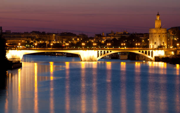 triana puente - seville sevilla bridge arch fotografías e imágenes de stock