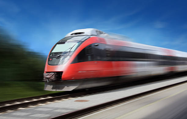 Fast Train Modern Fast Train in Motion high speed train photos stock pictures, royalty-free photos & images