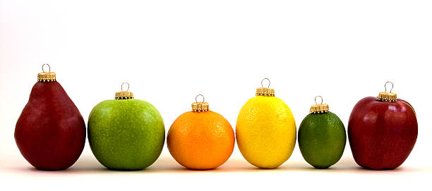 Fruit Christmas Ornament Line Up  bartlett pear stock pictures, royalty-free photos & images