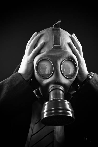 istock Distraught man in gas mask 157528681