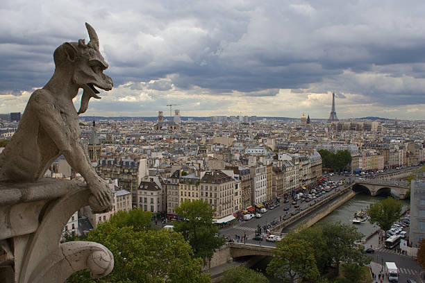 istock gargoyle over the city 157528688