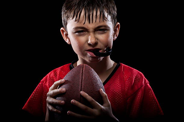 istock Young football player 157528836