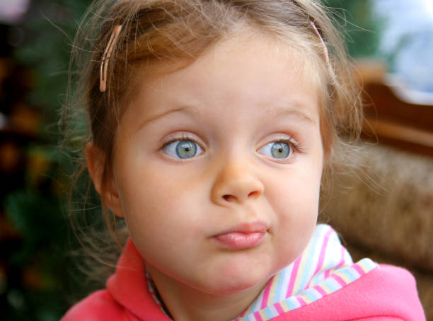 istock Little girl, funny face 157528955