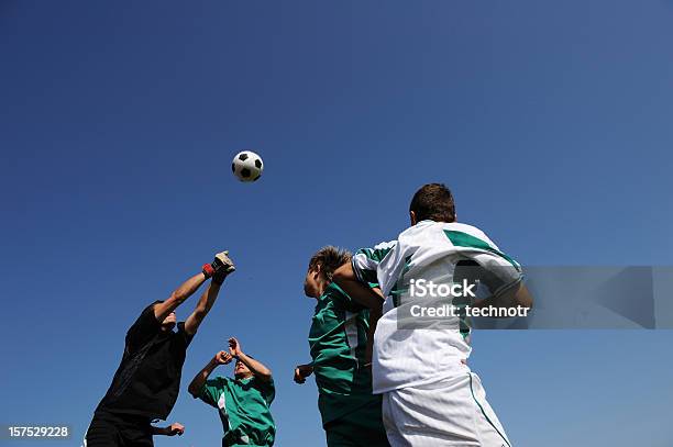 Vier Fußballspieler In Aktion Stockfoto und mehr Bilder von Sport - Sport, Aggression, Aktivitäten und Sport