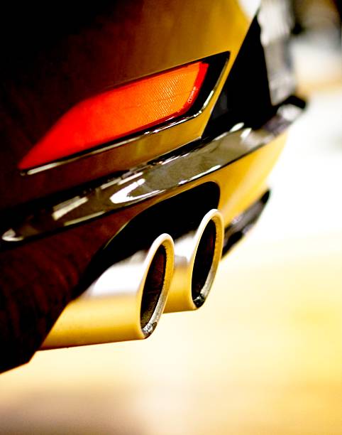istock Close Up of Car Exhaust and Red Tail Light 157529415