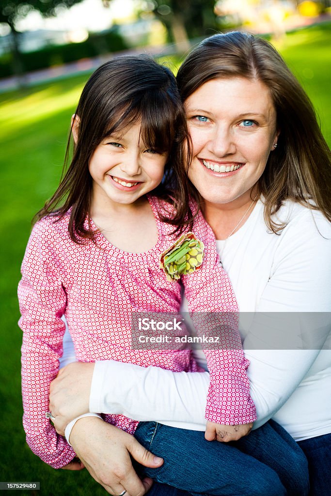 Mother Holding Daughter  Adult Stock Photo