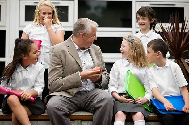 Photo of junior school: apple for teacher