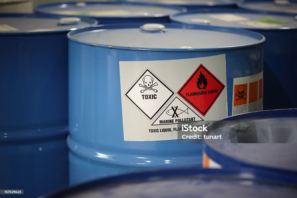 Toxic Substance In barrels in a factory. Toxic Waste Stock Photo