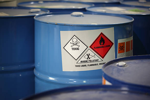 Toxic Substance In barrels in a factory. drum container stock pictures, royalty-free photos & images