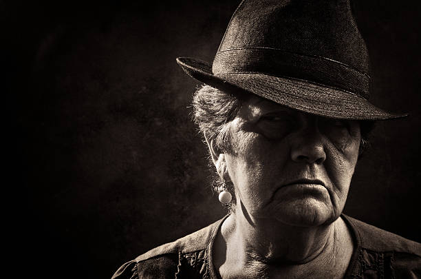 istock senior lady with fedora hat 157529703