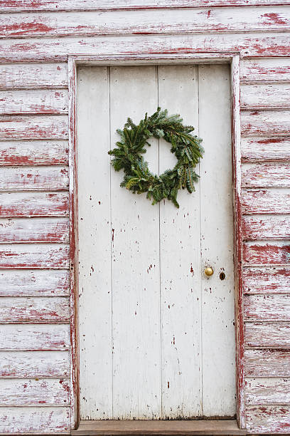 istock Weathered doorway with Christmas wreath 157529742