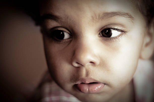 Portrait of a baby baby lying in bed