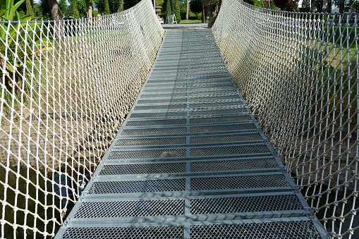 Steel rope bridges are used to cross wells for resort and accommodation tourism.