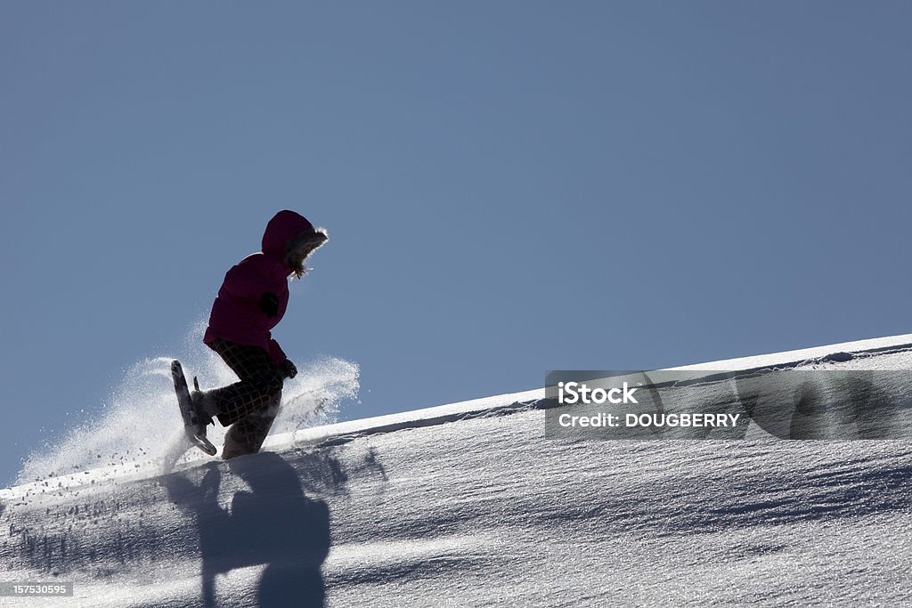 Child using snowshoes  8-9 Years Stock Photo