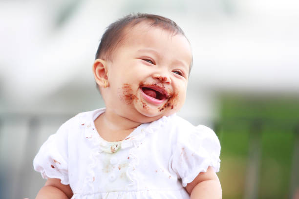 istock lovely baby laugh 157530679