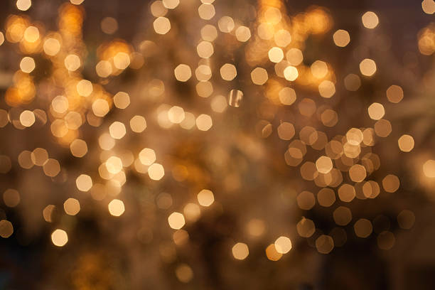 Golden lights defocused  bokeh light stock pictures, royalty-free photos & images