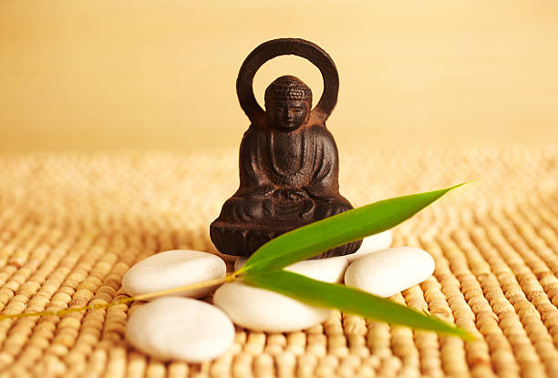 istock Spa still life buddha statue and river rock 157531045