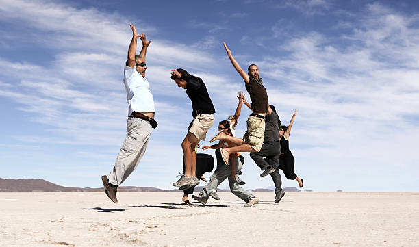 istock Jumping happy people 157531215