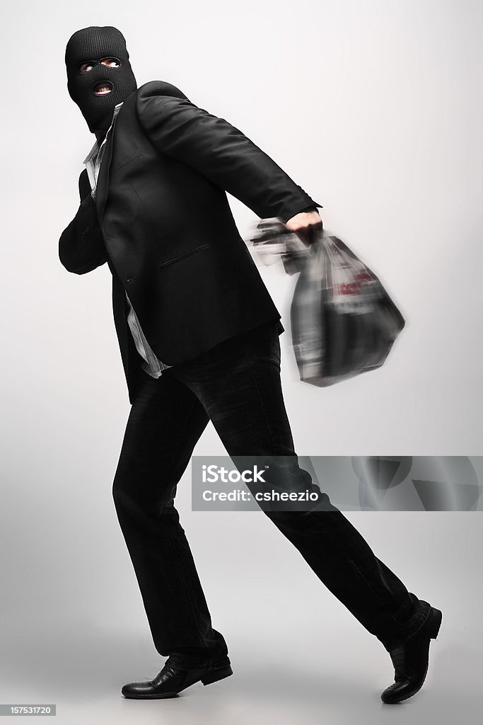 Business man stealing  Bag Stock Photo