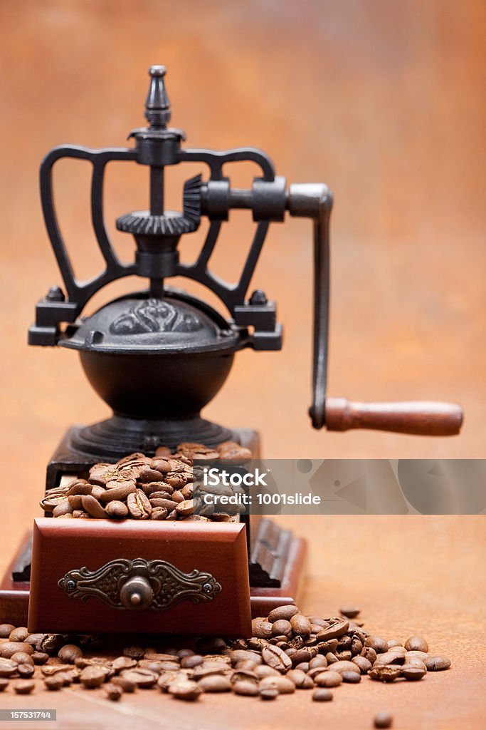 Coffee Grinder: Brown Coffee Grinder on rusty metal Breakfast Stock Photo