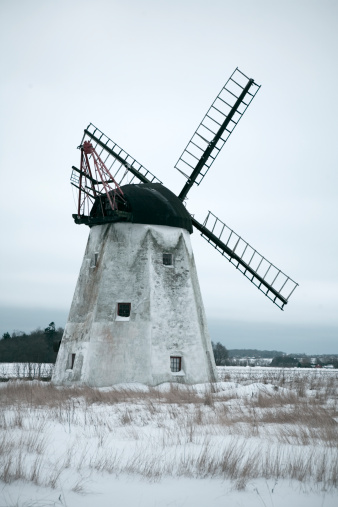 Old deserted windmill on the island Bornholm - in snow....