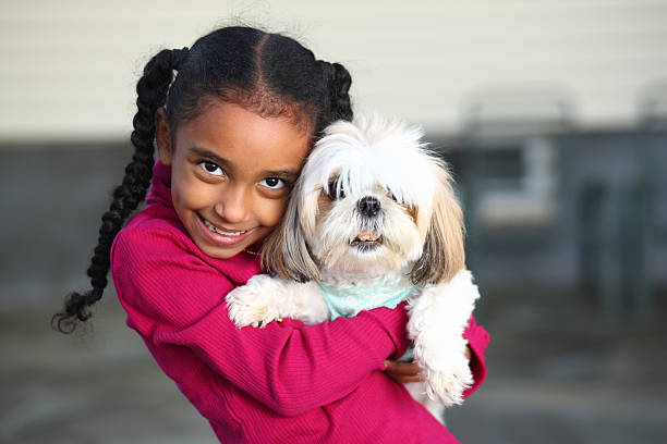 istock Girl with Shih Tzu 157532457