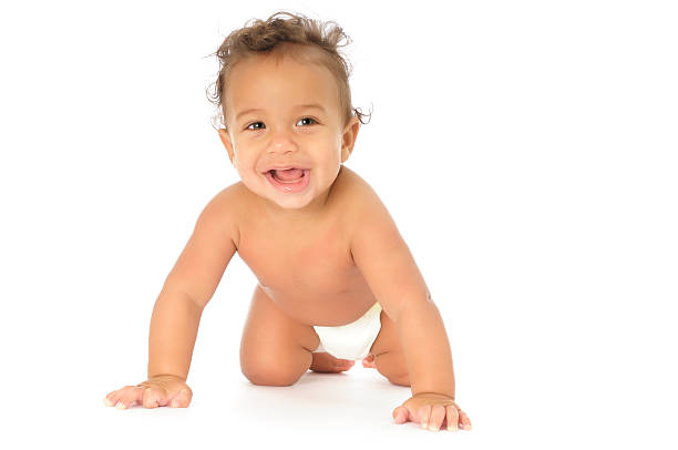 Baby Crawling - front view A 6 month old baby crawling crawling photos stock pictures, royalty-free photos & images