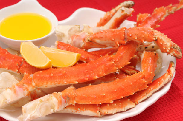istock Crab legs served with lemon and butter 157532566
