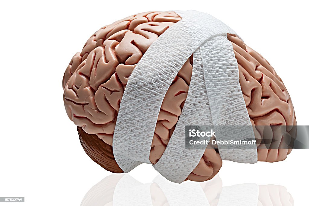 Brain Injury Gauze wrapped around a brain to symbolize a brain injury. Brain Damage Stock Photo
