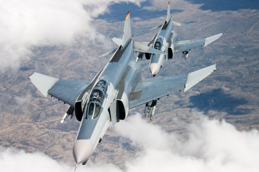 Two F-4 Phantoms flying in formation.