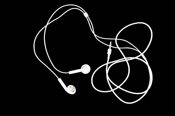 White Earbuds on Black stock photo
