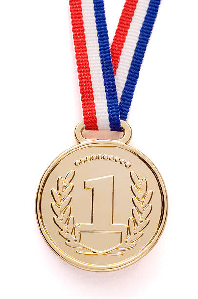 A gold medal, isolated on white.