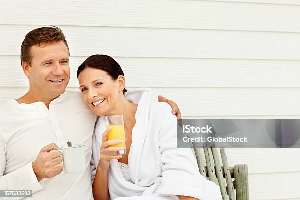 Happy Romantic Couple Enjoying Morning Refreshments Together Stock Photo - Download Image Now