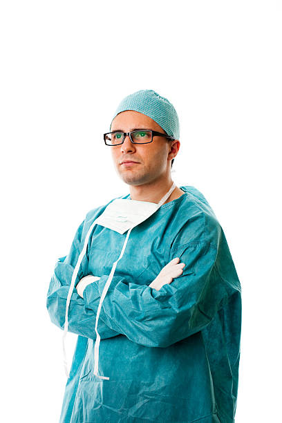 istock Male Surgeon Standing with Arms Crossed, Studio Portrait 157533939