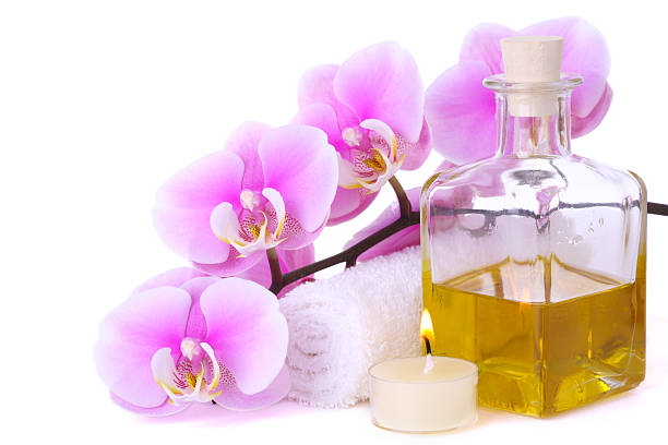 istock Orchid with towel, candle and massage oil 157534112