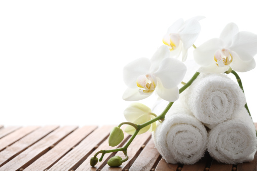 Spa concept with white orchid and towel